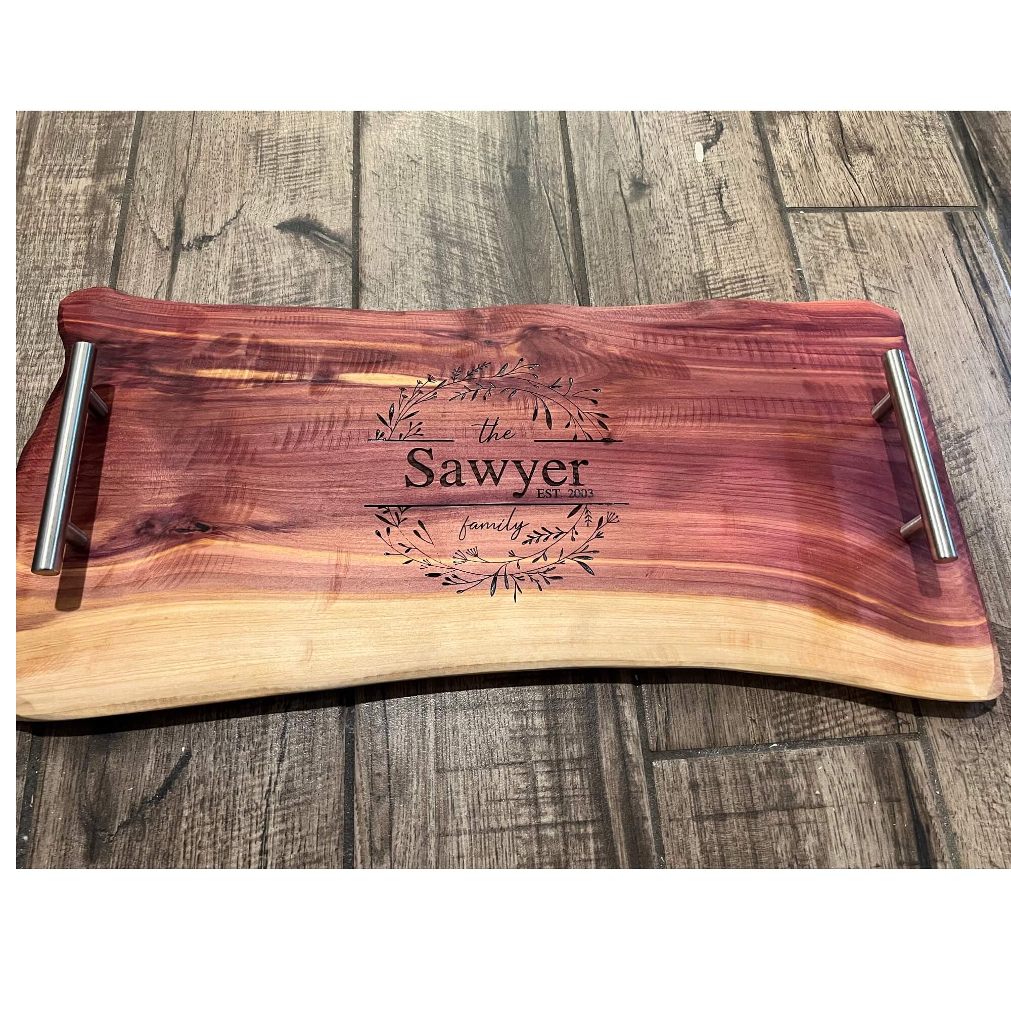 Elevate your kitchen aesthetic with our Handmade Cedar Charcuterie Board – a custom cutting board that tells your family's story.