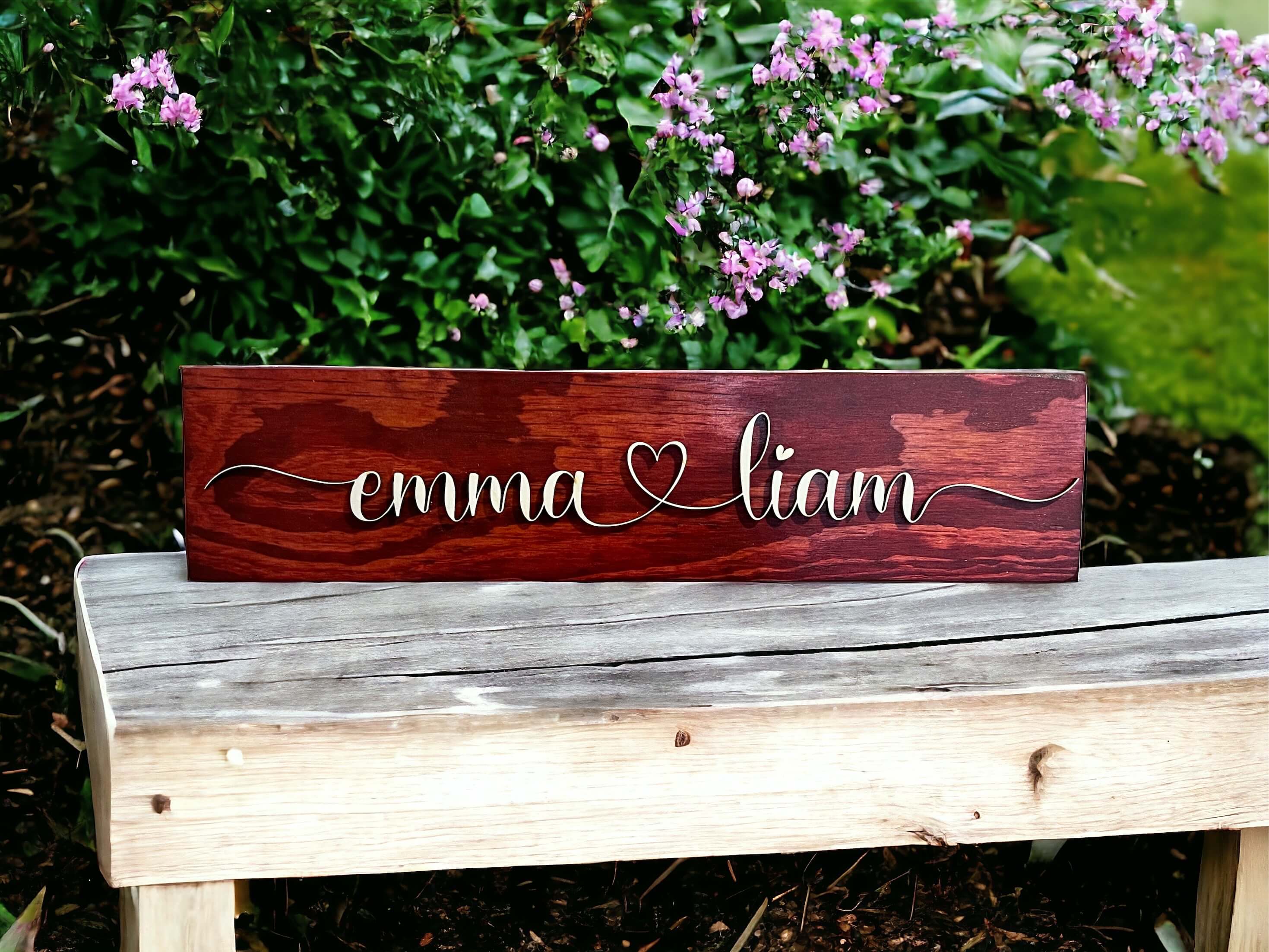 Charming couples name sign featuring hearts, perfect for wedding decor