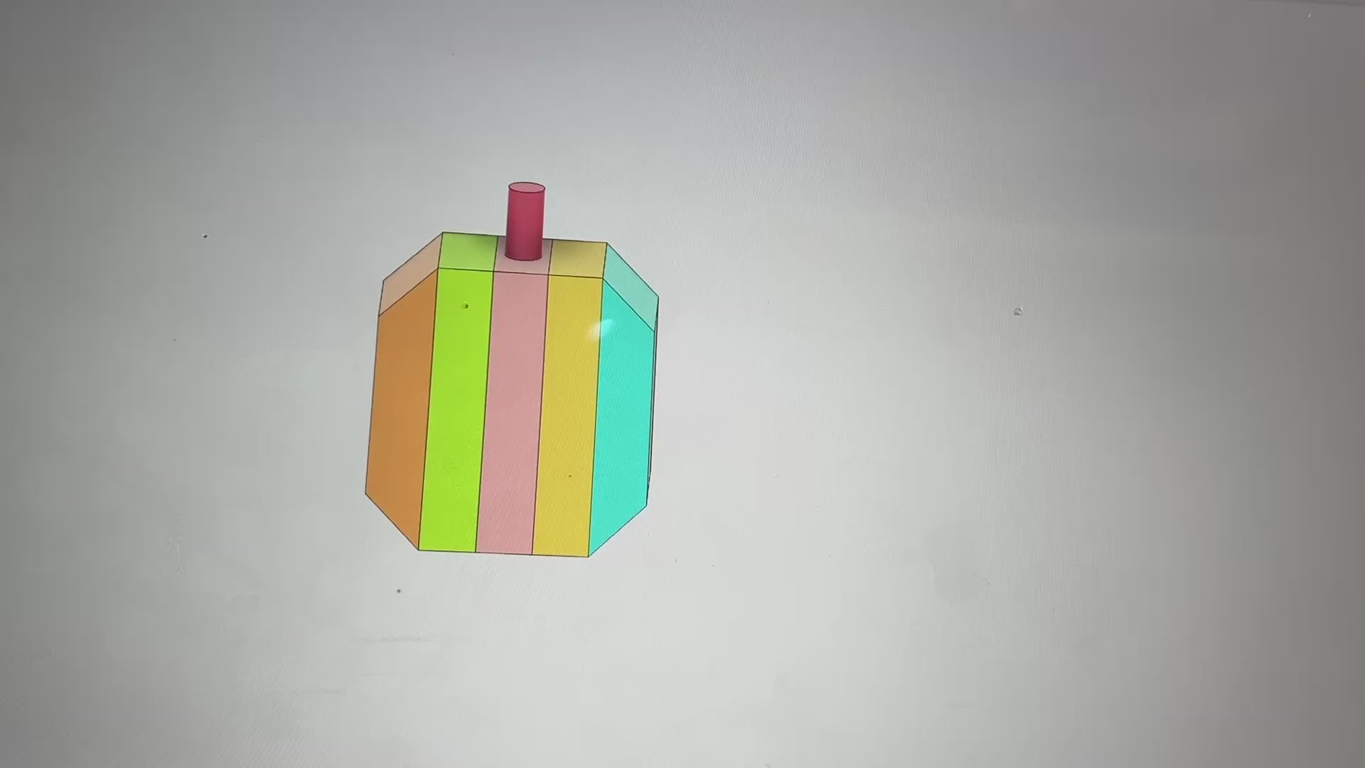 video for “Multi-colored wooden pumpkin build plan PDF screenshot with blurred areas for copyright protection