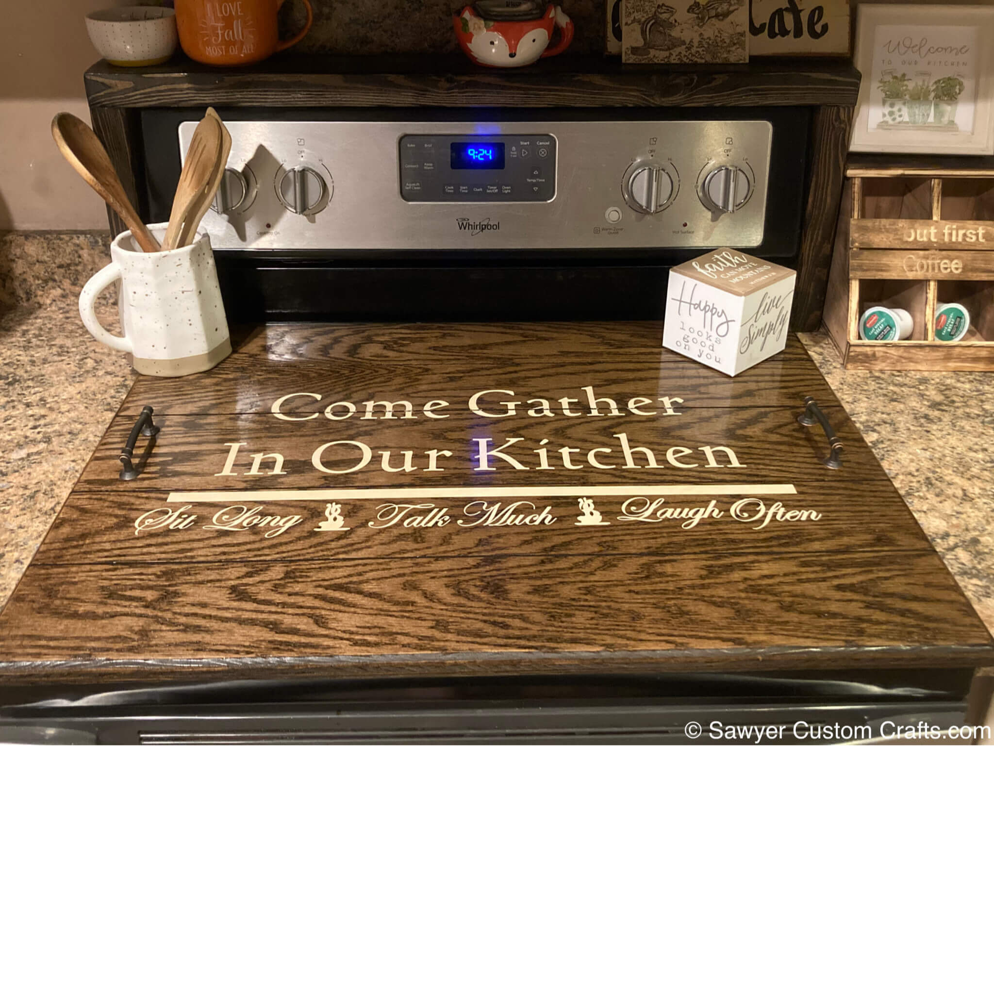 Noodle Board with handles. with the words " Come Gather In our Kitchen" painted on it in an off-white/cream color. Also has the words sit long, talk much, and laugh often painted on it.