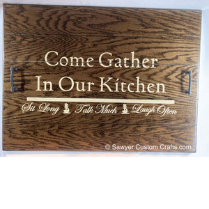 Stove Topper on white background. with the words " Come Gather In our Kitchen" painted on it in an off-white/cream color. Also has the words sit long, talk much, and laugh often painted on it.