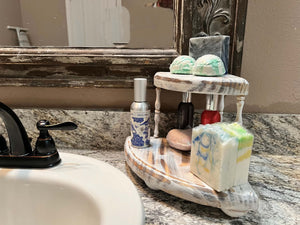 Rustic wooden pedestal riser shown here on the right side of sink on bathroom countertop. works great for displaying things or also works great in dorm room college bathrooms